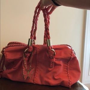 Bebe handbag, pinkish orange color